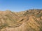 Dry Desert Hillside with Boulders