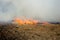 Dry forest and steppe fires completely destroy fields and steppes during severe drought. Disaster causes regular damage to the