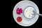 Dry Fruits Mixed Curd In Glass Bowl With Red Rose And Tutti Frutti On White Plate, Isolated On Black