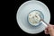 Dry Fruits Mixed Curd In Glass Bowl On White Plate, Isolated On Black Background