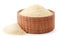 Dry gelatin granules in a wooden bowl on a white background. Isolated