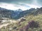 Dry grass and heather bushes at mountain trekking path