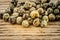 Dry green peppercorn on wooden background