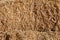 Dry hay straw yellow background texture. Dry rice straw texture for background and design, hay bale pattern in sunlight