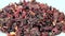 Dry hibiscus plant on 360 degree rotating stand, very close macro shot