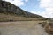 Dry lake, frailejones and rock hills on Sumapaz Paramo.