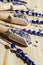 Dry lavender flowers in wooden spoons on the table. Organic tea ingredient. Herbal calming, relax beverage.