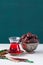 Dry medjoul dates in a vintage bowl with turkish tea in a glass