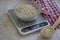 Dry oatmeal, kitchen scale, kitchen uncooked