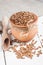 Dry Organic Brown Lentils against a wooden background