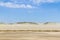 Dry over wet sand and dunes in Cassino beach