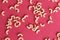 Dry pasta texture on a red background