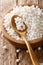 Dry pearl tapioca ingredient for cooking closeup in a bowl on a table. vertical