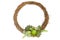 Dry rattan wreath with mix of green and red echeveria succulent flowering plant arrangement on white background
