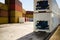 Dry and refrigerated containers stacked in a port terminal