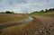 Dry river on drought parched ground.