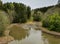 Dry riverbed during drought on a small river in Norway