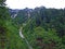 Dry riverbed of seasonal alpine torrential stream above the Rhine river valley Rheintal - Schaan, Liechtenstein