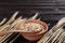 Dry rolled oat flakes oatmeal on old  table