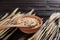 Dry rolled oat flakes oatmeal on old  table