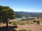 Dry Siurana reservoir during the summer, view of the medieval village of Siurana with the river almost dry