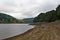 Dry slopes and banks of Lady Bower reservoir in late summer.