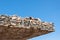 dry stone masonry bridge awning against blue sky