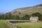 Dry stone wall and field barn cowhouse Swaledale
