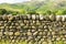 Dry stone wall north England countryside Lake District National Park Cumbria uk traditional structure with no mortar