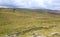 Dry stone walls and high moorland.