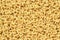 Dry uncooked cellentani pasta texture background