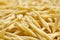 Dry Uncooked Trofie Italian Pasta . Food Background