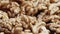 Dry walnut background, close up nut, rotation. Food background