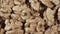 Dry walnut background, close up nut, rotation top view. Food background