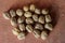 Dry walnuts Juglans in their shells.