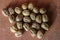 Dry walnuts Juglans in their shells.