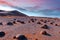 A dry waterway of thousands of years in the New Valley desert in Egypt where erosion factors made the big rock circular like giant