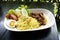 Dry Yellow Noodles with egg, salad, sausage and braised pork