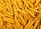 Dry yellow penne pasta