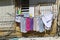 Drying clothes on a rope on windows and balconies