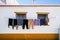 Drying cloths in front of traditional Alentejo house in Almodovar, Portugal