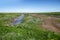 A drying river in the spring steppe