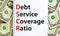 DSCR debt service coverage ratio symbol. Concept words DSCR debt service coverage ratio on white note on beautiful white