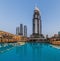 DUABI, UAE - MARCH 10, 2017: Address Downtown skyscraper behind Dubai Fountains Lak