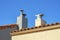 Dual chimney on a cityscape in the suburban area of the historic districts of San Francisco California in the late