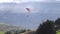 Dual Or Tandem Paragliding Against Powerful Sunlight