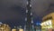 Dubai Burj Khalifa at night time lapse. pan up