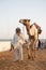 Dubai camel racing club camel and keeper.