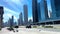 Dubai city exterior during daytime, modern city, high rise buildings with blue sky