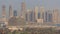 Dubai Creek Harbor with skyscrapers and towers under construction aerial timelapse